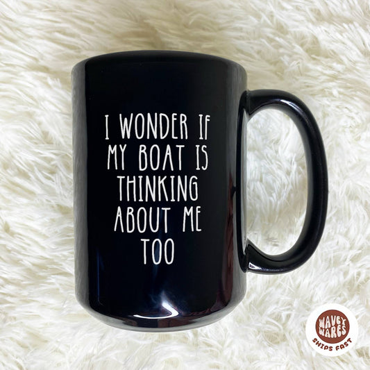 I Wonder If My Boat Is Thinking About Me Too Black Mug