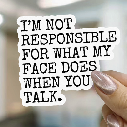Sticker with text 'I'm not responsible for what my face does when you talk' held by a hand.